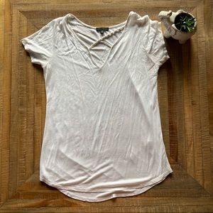 White tee with neckline cross